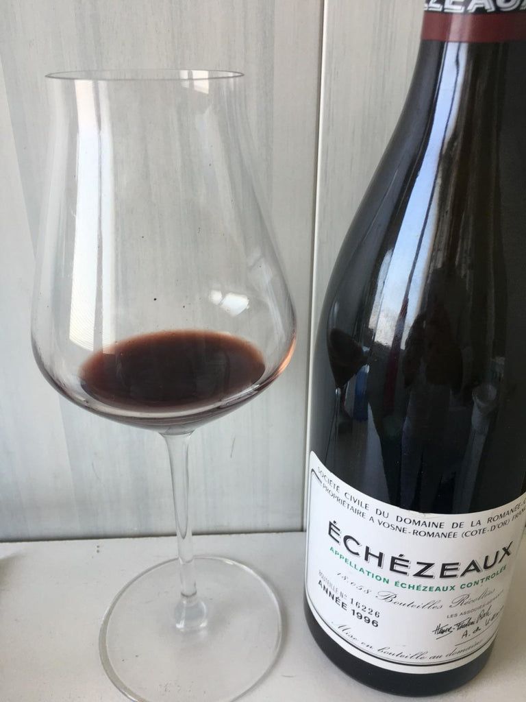 DRC Échezeaux 1996 — Domaine de la Romanée-Conti bottle and glass of Pinot Noir