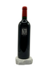 Wine bottle with red cap on a white background